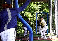 041721V09535 Matthew Alvear throws to Matt Torres in batting cage at Westlake pregame sm